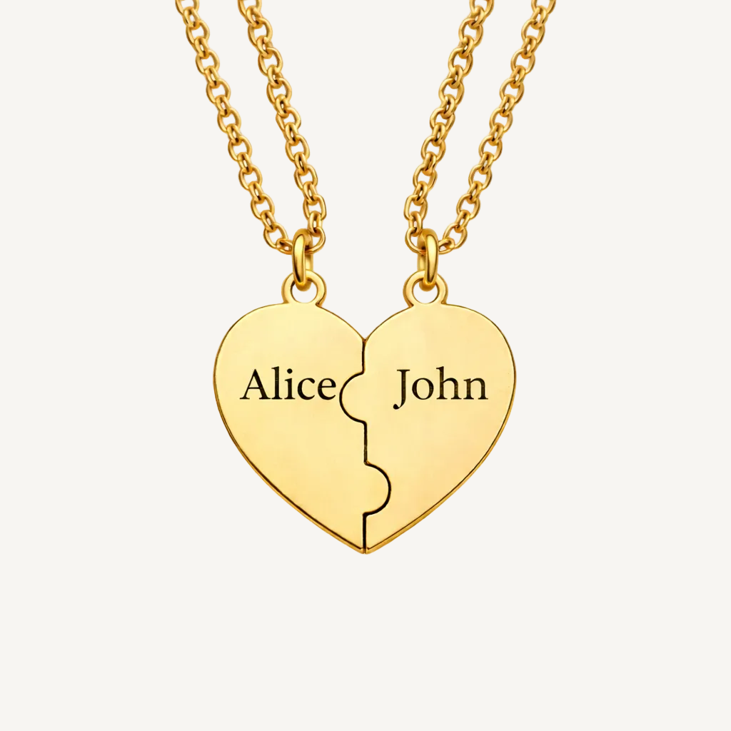 Gold heart-shaped pendant with 'Alice' and 'John' engraved on a beige background